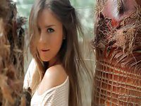 Exotic nineteen year old seduces the camera while stripping in this solo porn video