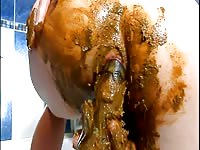 Big dildo got covered with a whore's nasty poop