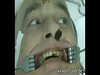 Sadistic lady torturing a bald man