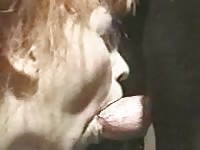 Sexy MILF wife sucks a dog's dick
