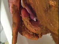 Shit lover covers his dick with poop