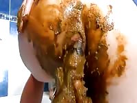 Slut pulling shit out of her ass