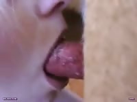 Blonde beastie gal sucks on dog xxx video