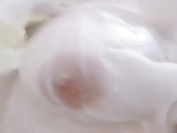 Busty sluts films herself while taking a bath